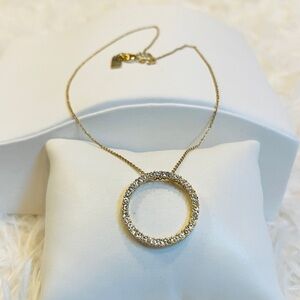 Delicate gold tone, bling circle pendant costume necklace​